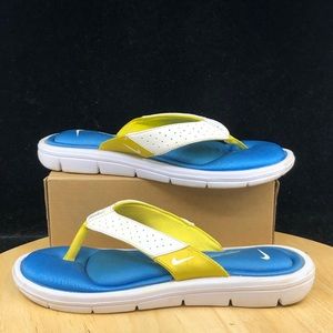 yellow nike flip flops